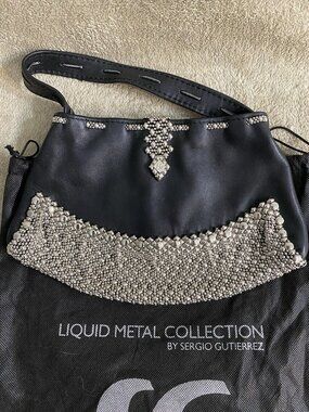 Liquid Metal & Black Leather HandBag by Sergio Gutierrez
